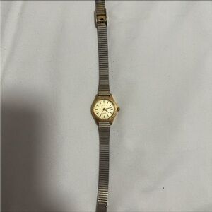 Vintage little gold watch